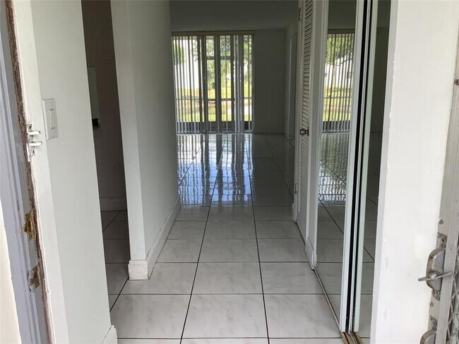 Building Photo - 8220 Sunrise Lakes Blvd