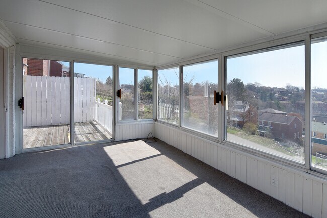 Outdoor deck adjacent to sunroom - 121 Owendale Ave