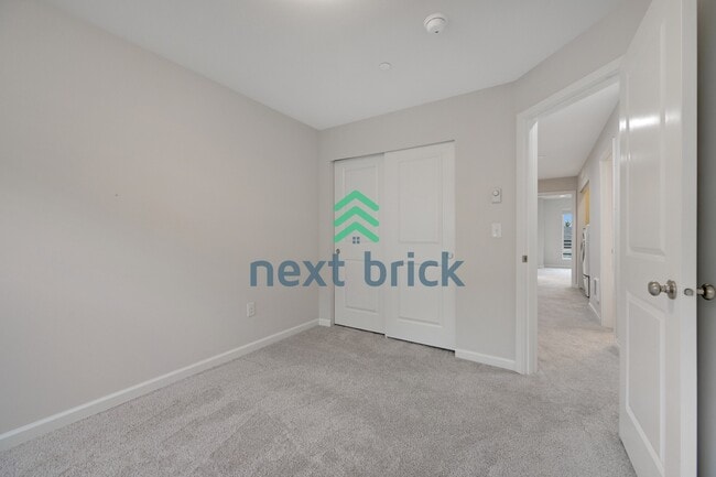 Building Photo - A Beautiful Corner Home Designed for Comfort, Light & Community!