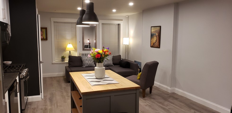Large open living/dining area - 443 E 141st St