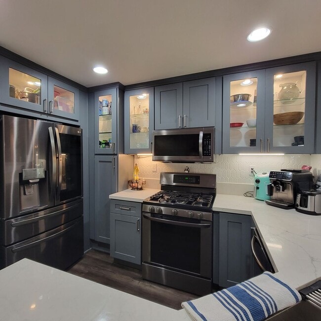 Building Photo - MOVE-IN SPECIAL $500 OFF! Otay Ranch - Gorgeous 2 Bed/2 Bath Condo with Garage