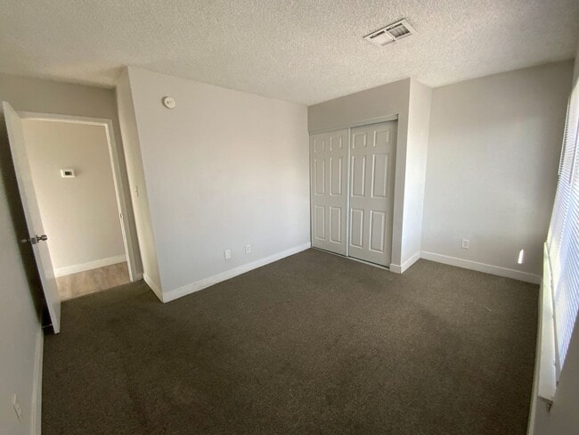Building Photo - ***JUSTED REDUCED!!!*** Two-bedroom, one-and-a-half-bath townhouse in North Las Vegas.