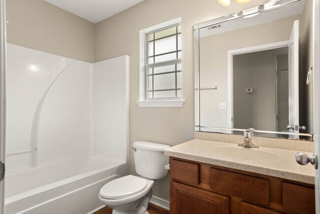 Building Photo - Stunning 4-Bedroom Home with Scenic Lake V...
