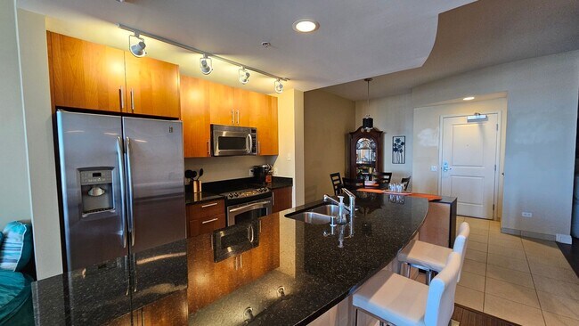 Building Photo - GORGEOUS FURNISHED 1 BEDROOM CONDO AT ALLU...