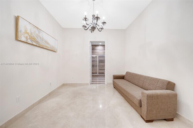 Building Photo - 15811 Collins Ave