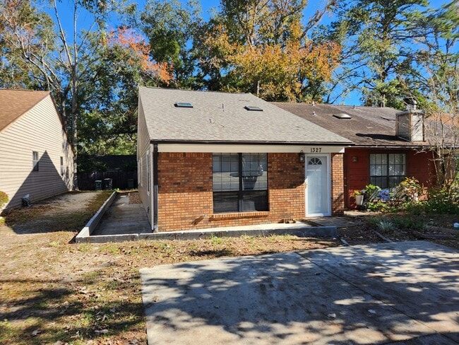 Building Photo - Remodeled 2 bedroom duplex with all wood floors for rent May 6, 2026 for $1350 per month