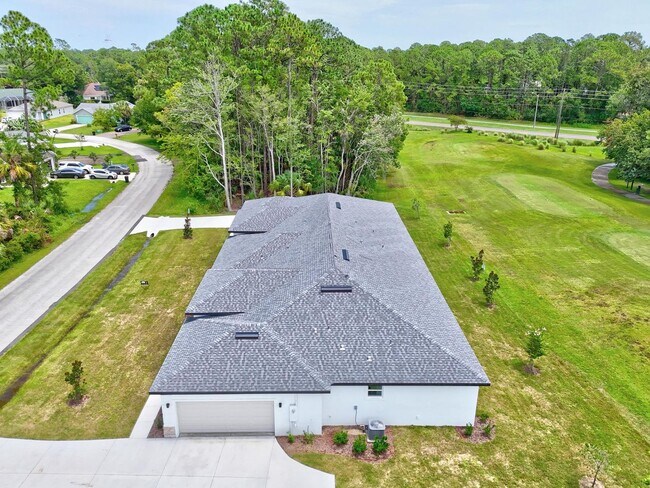 Building Photo - Brand New Townhome Overlooking the 15th Fairway