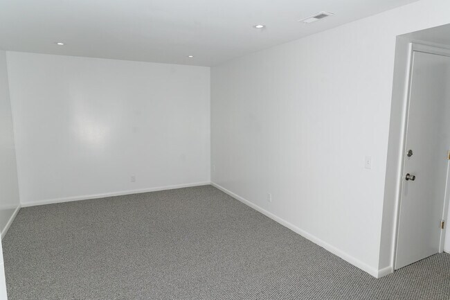 Lower level carpeted Media/Fitness/Extra Bedroom - 455 Hope St