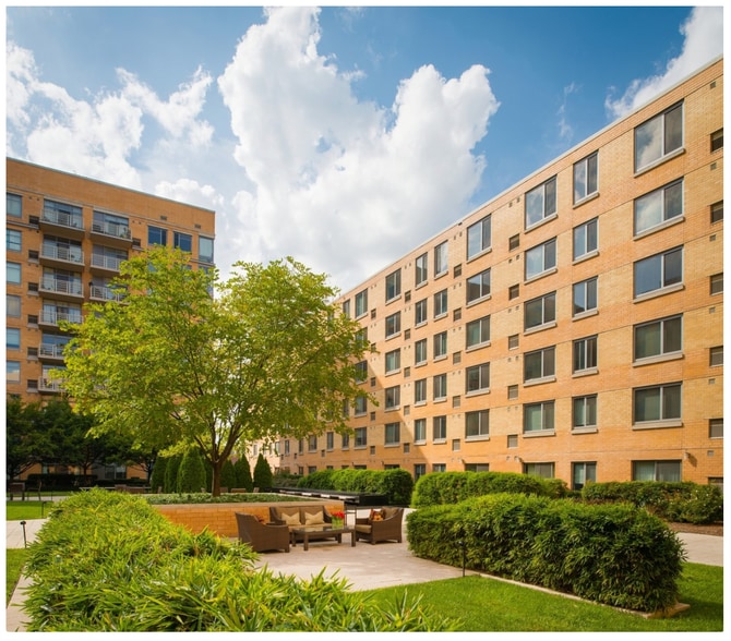 Complex's courtyard. Can enjoy a nice book on the grass during the fall/spring, etc. - 440 L St NW