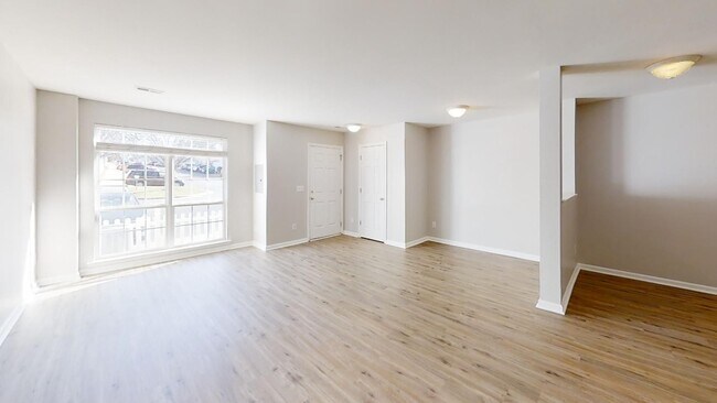 Building Photo - Townhome | Hard Surface Floors Through-Out...