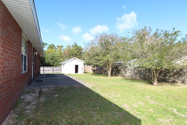 Building Photo - Updated 4BR Home Near NAS - Split Floor Pl...