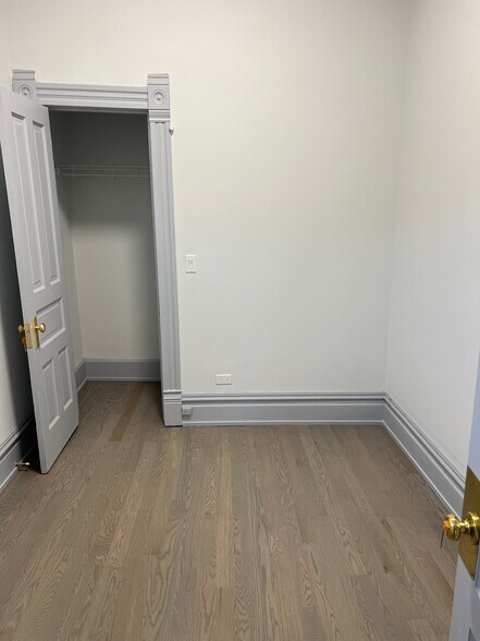 Bedroom 1 (closet). - 2057 W Chicago Ave