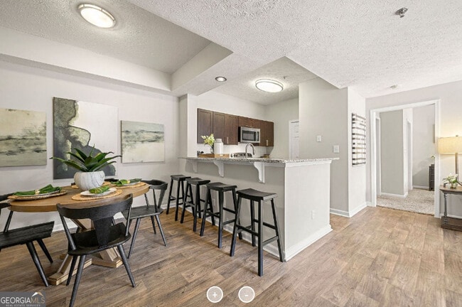 Building Photo - 7150 Peachtree Dunwoody Rd NE