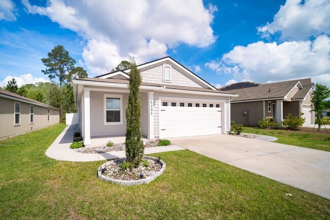 Building Photo - Spacious 4-Bedroom Home with Fenced Yard & Community Amenities – Available June 30th!