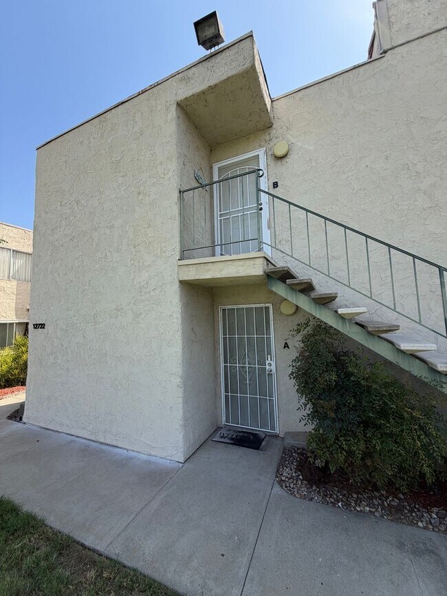 Building Photo - 2BR/1BA Lakeside ground floor condo with 1 car detached garage, 1 uncovered parking space & commu...
