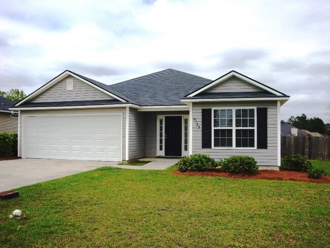 Primary Photo - Charming 3BR/2BA Home with Fenced Yard, Ga...