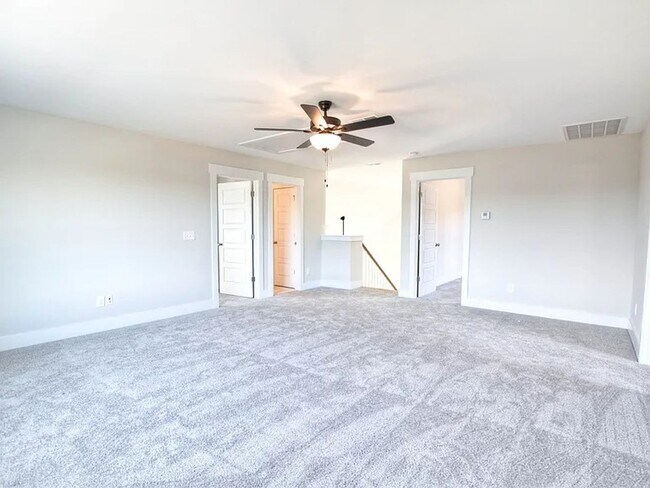 Building Photo - Situated on over 3 acres right in a growin...