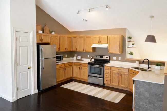 Unlimited kitchen storage and new quartz countertops. - 1102 Bergmann Dr