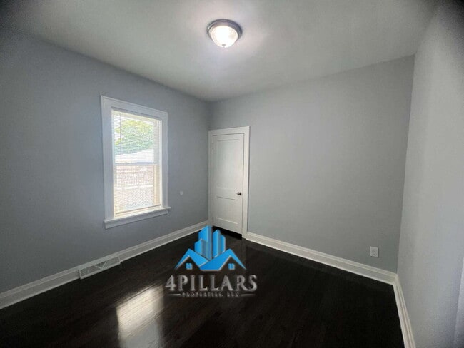Building Photo - "Charming 3-Bed Home with Partially Finished Basement & Gleaming Hardwood Floors in Hammond - 226...