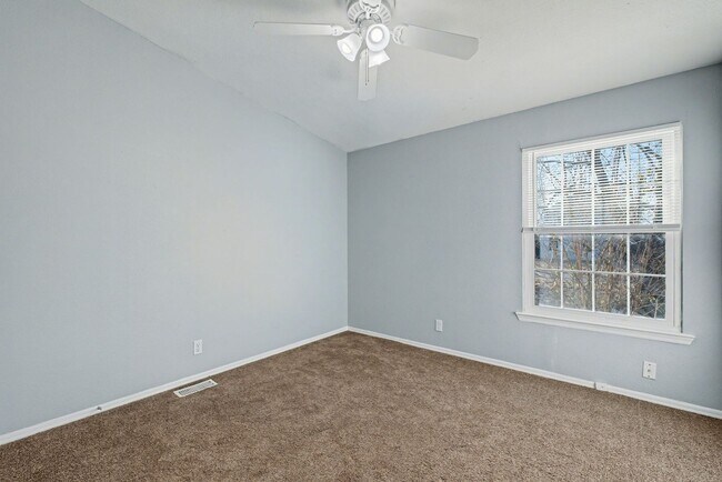 Building Photo - 3-Bed Home with Fireplace, Fenced Yard & Flexible Living Space