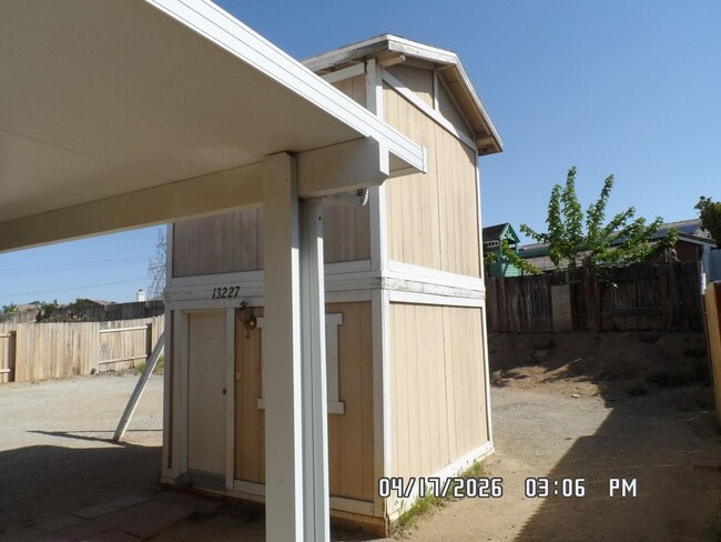 Building Photo - 3 Bedrooms, 2 Bathrooms, approx. 1392 sq. ft., 2 Car Garage, Covered Patio, Fenced, Play house,