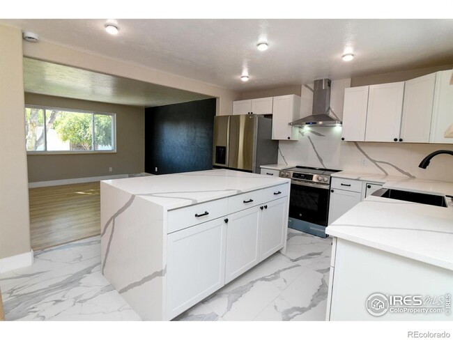 Building Photo - Remodeled home with separate finished base...