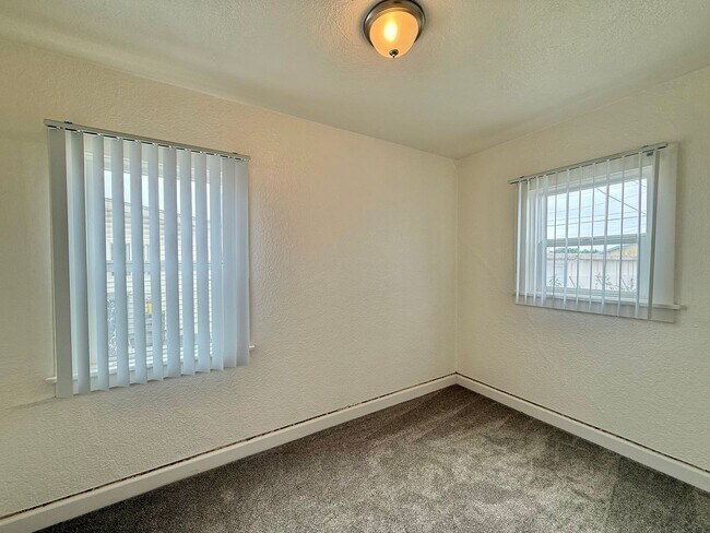 Building Photo - 2 Bedroom Home nestled in City Heights! With Parking!!