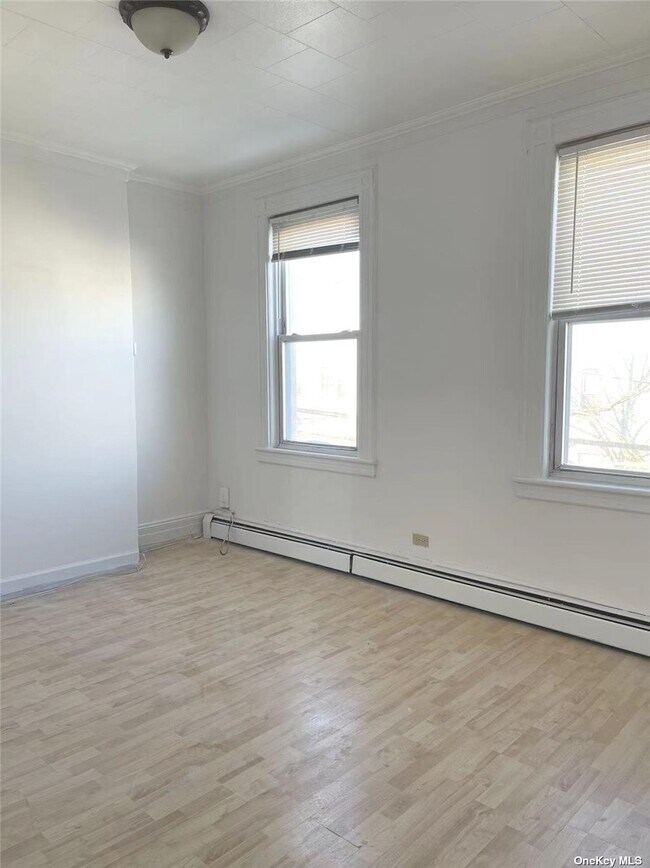 Building Photo - 60-12 56th Dr