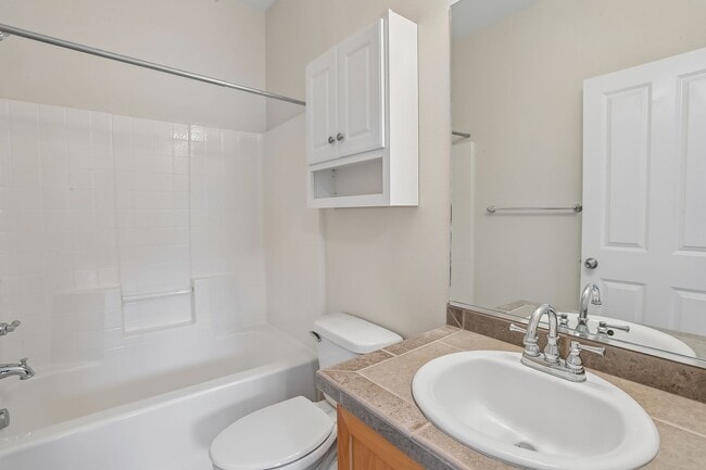 Building Photo - Dual-Suite 2BR/2.5BA Townhome-Style Condo — Gas Fireplace, Balcony & Attached Garage | Heron Cree...