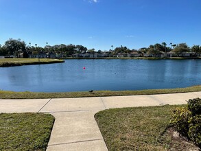 Building Photo - 1/1 Furnished with Lake View & Utilities in Tahitian Gardens a 55+ Community.