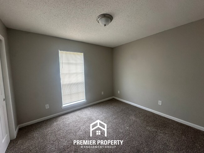 Building Photo - Modern 3BR/2BA Bartlett Area Home | Brick Fireplace & Spacious Fenced Yard