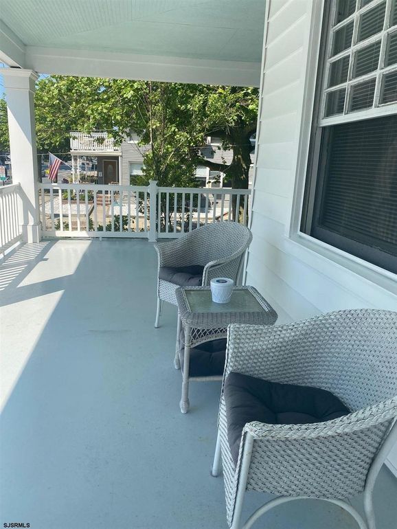 Main Porch seating area 1 with Ocean Views - 4907 Atlantic Ave