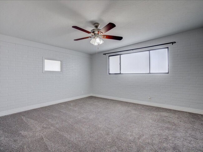 Building Photo - Spacious 4-Bedroom, 2-Bath Home with Extended Driveway & Large Backyard