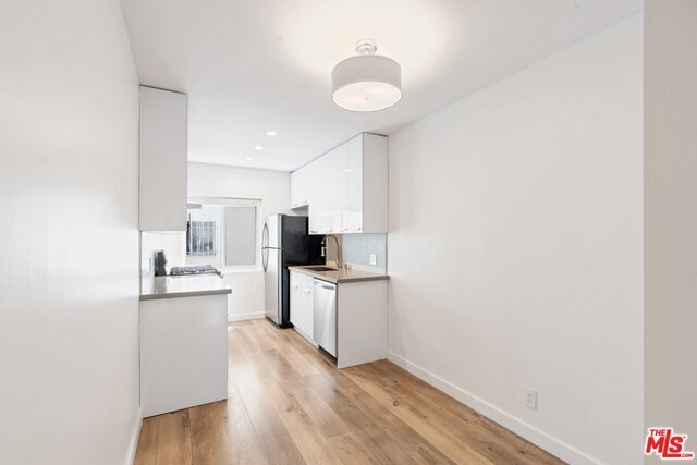 Building Photo - 702 S St Andrews Pl