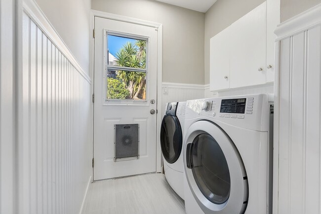 Laundry Area with Door to Backyard - 10 Tucker Ave