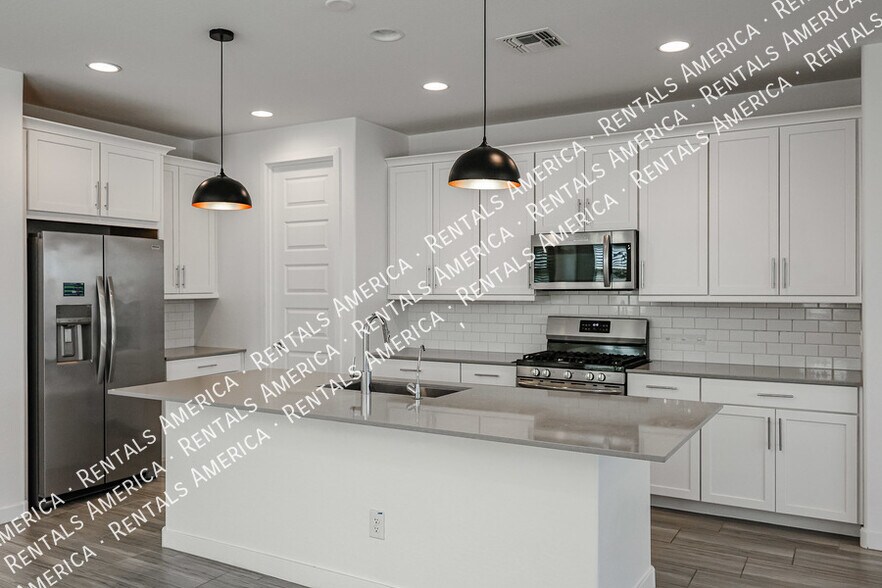 Building Photo - 12380 W Wagon Wheel Dr