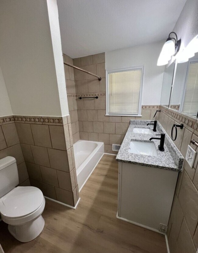 Building Photo - Spacious 4-Bedroom Home with Finished Base...