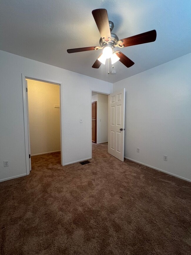 Building Photo - NICE 3 BEDROOM, 2.5 TOWNHOUSE W/ 2 CAR GAR...