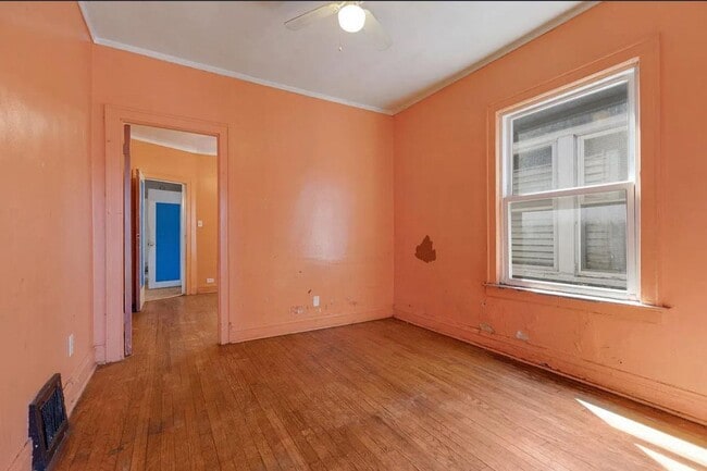 Building Photo - 1301 W 71st Pl