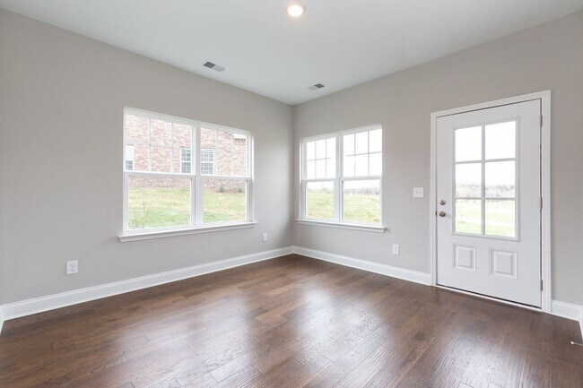 Building Photo - **BE THE LUCKY ONE TO LIVE IN THIS 2022-BUILT UPSCALE COTTAGE HOME IN THE PRESERVE AT BELLE POINTE**