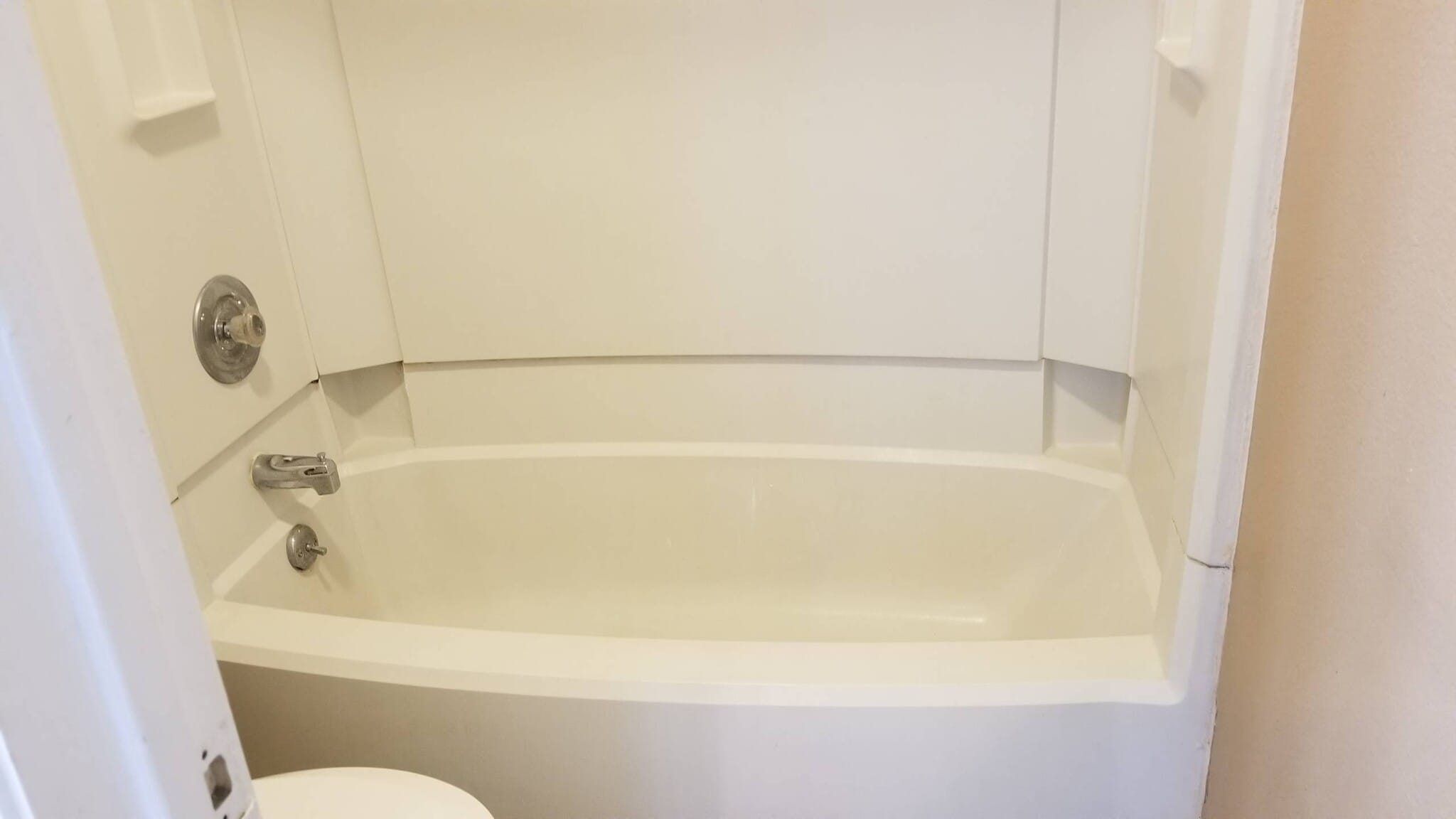 Tub enclosures are one-piece for easy cleaning (no grout) - 14519 Clovelly Wood