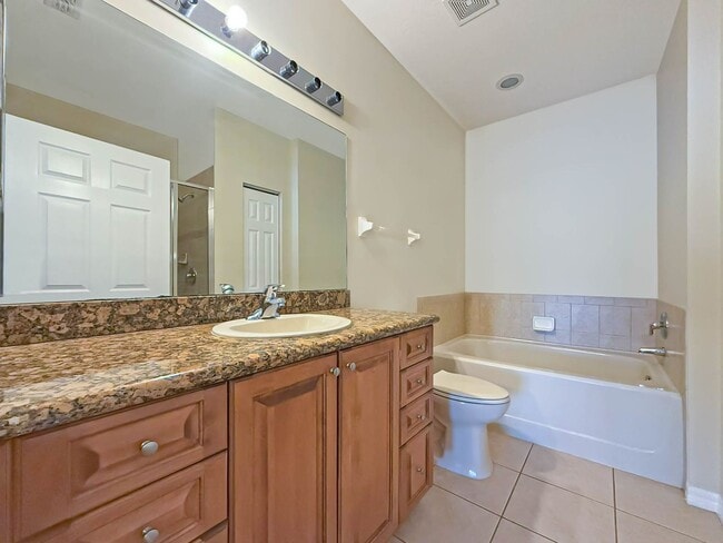 Building Photo - Beautiful 3-Bedroom Condo with 2-Car Garag...