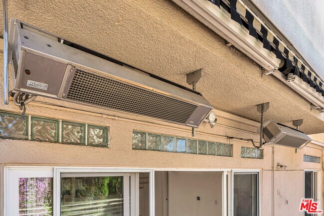 Building Photo - 4477 Woodman Ave