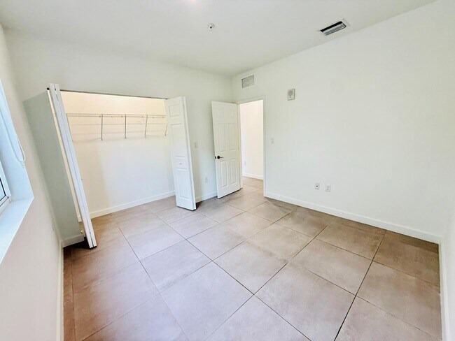Building Photo - 1295 W 69th St