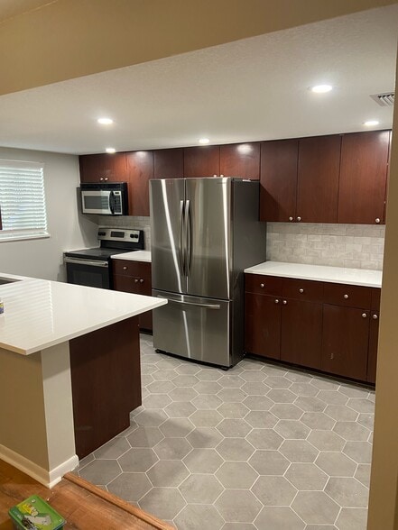 large kitchen with dishwasher - 125 5th Ave NE