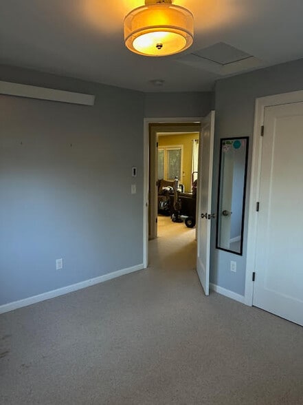 Bedroom 3 looking into Master Hall and Family Room - 16715 SE Evergreen Ln