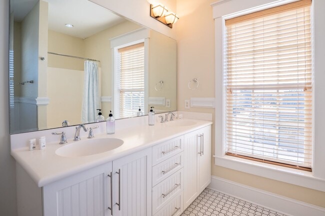 Building Photo - ENJOY OCEAN BREEZES FROM THIS FURNISHED OF...