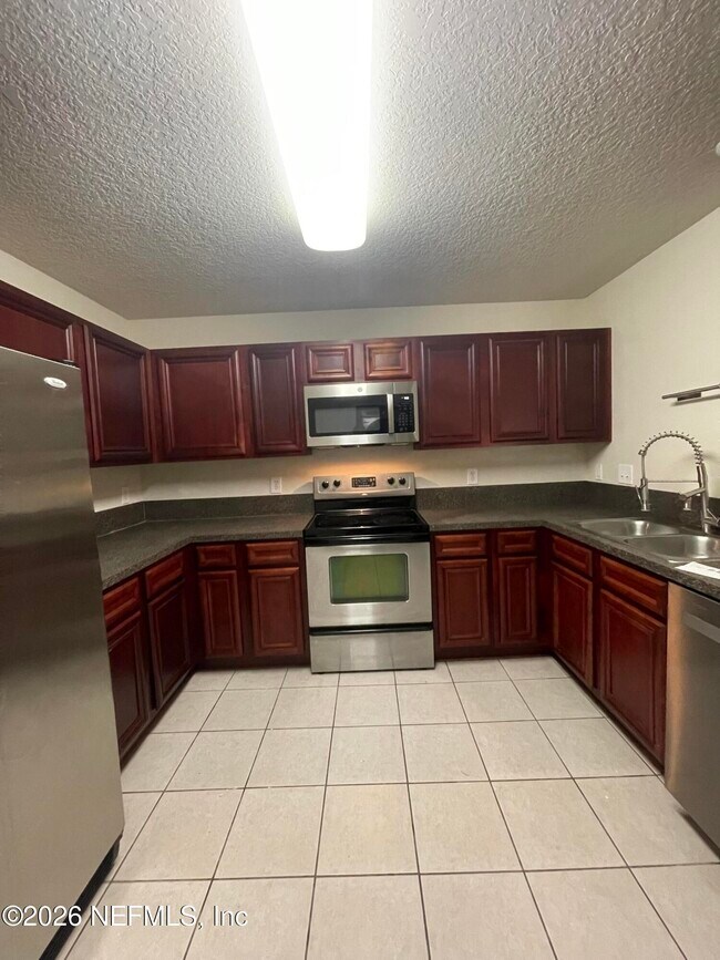 Building Photo - 6965 Ortega Woods Dr