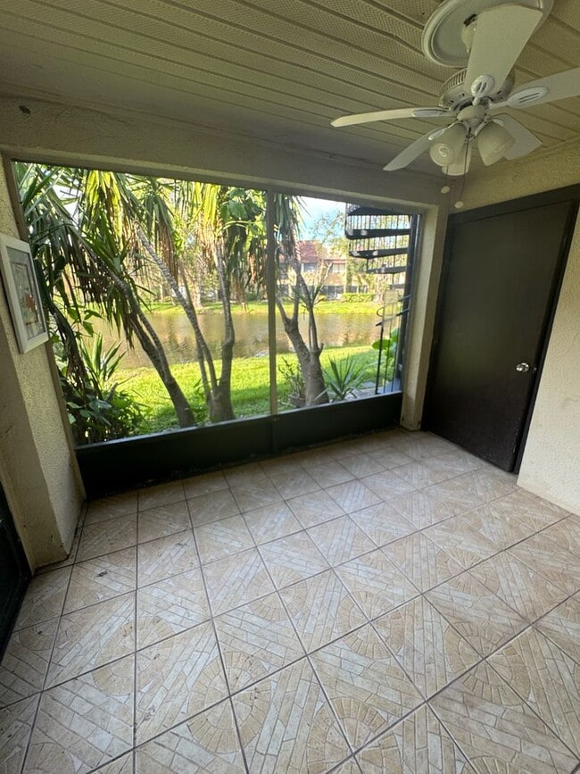 Building Photo - 3 BR / 2 BA Ground-Floor Condo | Screened ...