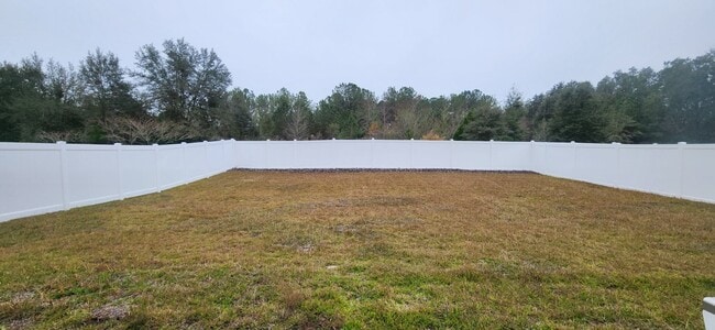 Building Photo - 4/3 with 3 car garage in Tara Estates